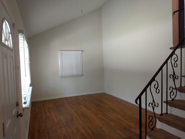 Building Photo - TRI-LEVEL HOME WITH GARAGE AND LARGE FENCE...