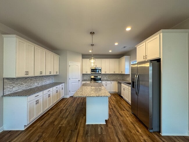 Building Photo - Stunning 4 Bed Home with Fenced Backyard