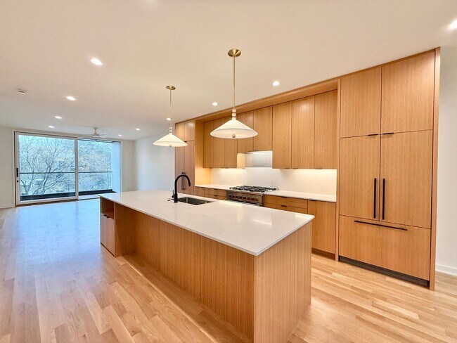 Building Photo - Luxurious New Construction 4BD, 2.5BA Raleigh Townhome with a Rooftop Terrace in a Prime Location...