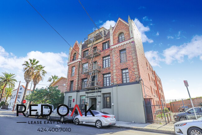 Building Photo - Lovely Studio with Exposed Red Brick, Stai...