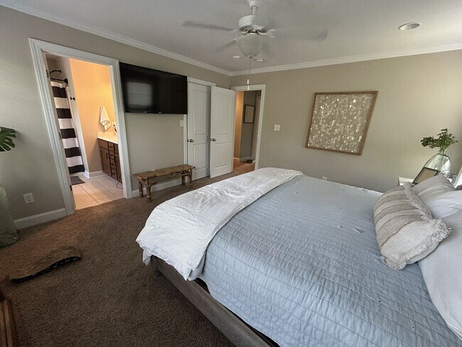 Building Photo - Enjoy private living in this beautiful 3 bedroom, 2.5 bathroom home on almost half acre lot!