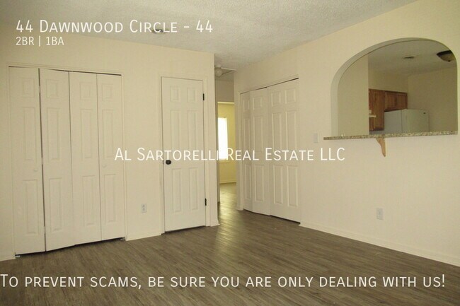 Building Photo - Pet Friendly Condo close to town and ready...