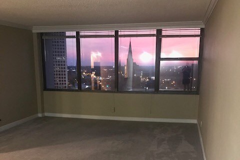 Living Area with wonderful view. - 450 W 7th St