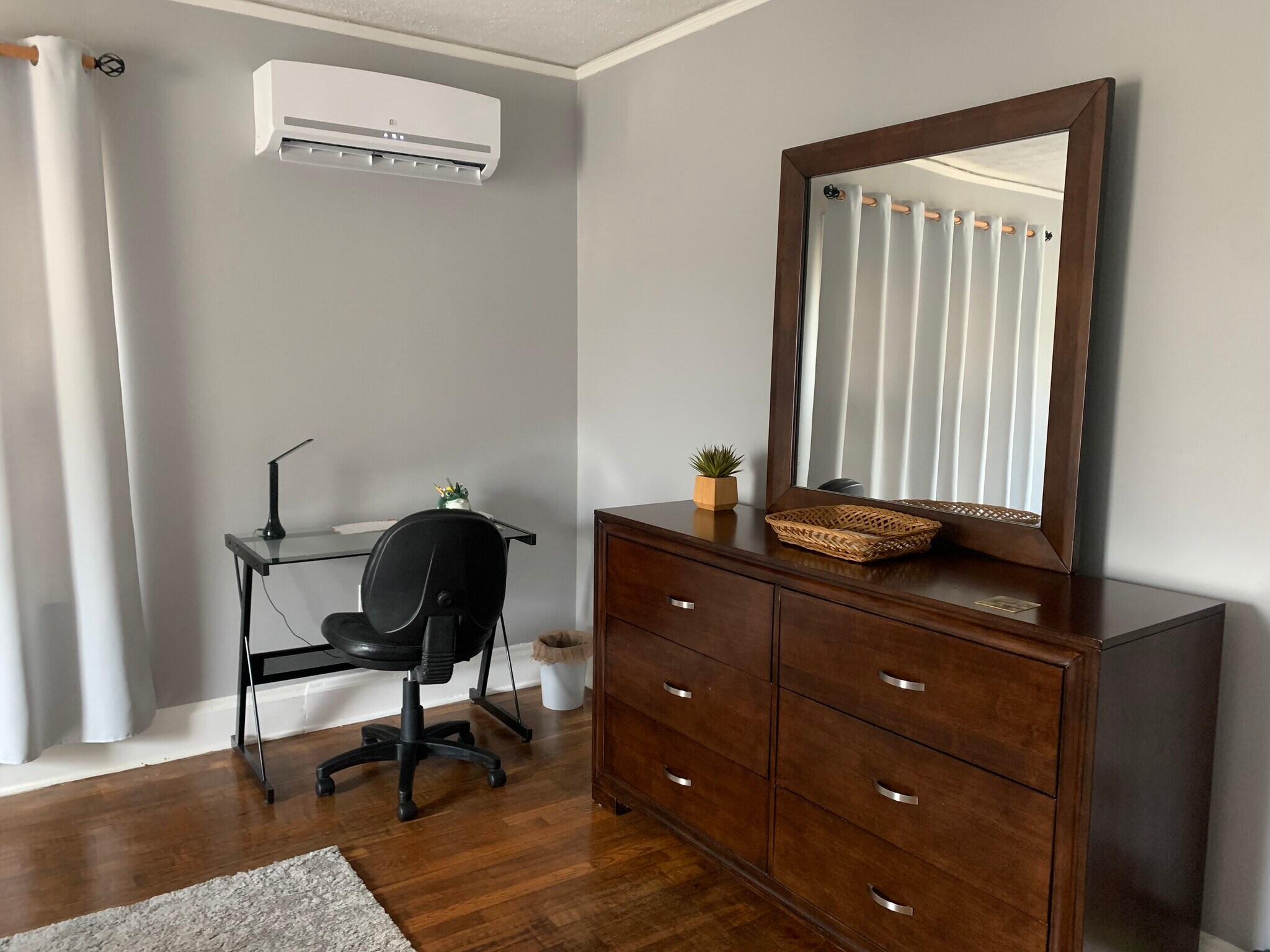 Mini split unit in bedroom provides AC/heat - 1411 Winburn Dr