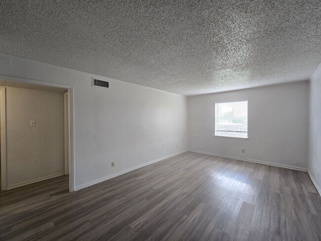 Building Photo - NEW VINYL FLOORING - AVAILABLE NOW!