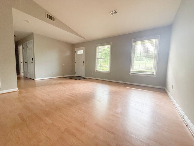 Building Photo - Spacious 3-Bedroom Home with Screened Porch, 2-Car Garage + Workshop