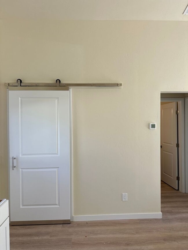 Building Photo - Bright & New 2 Bed / 2 Bath with Vaulted Ceilings & Covered Parking!