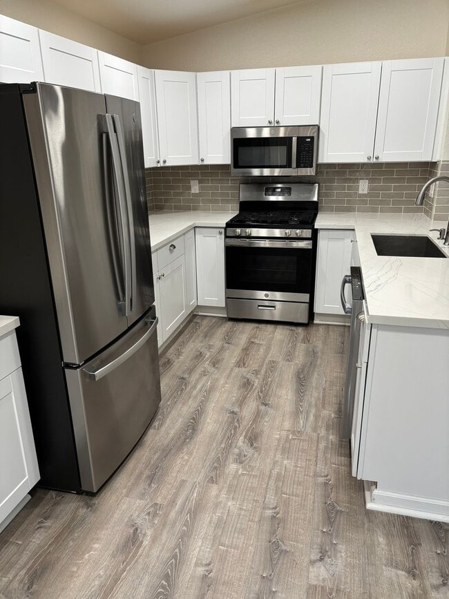 Building Photo - Freshly Remodeled 4 bedroom in Red Rock- RV Parking, low maintenance yard and pets welcome!