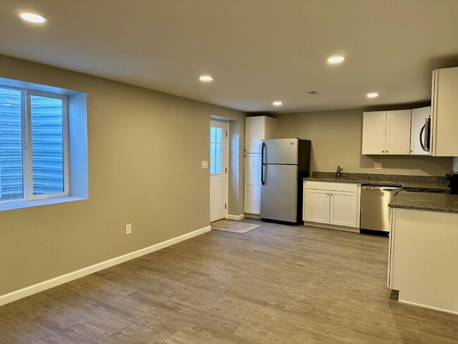 Building Photo - Charming 2-Bedroom Basement Unit with Private Yard – Flat-Rate Utilities!