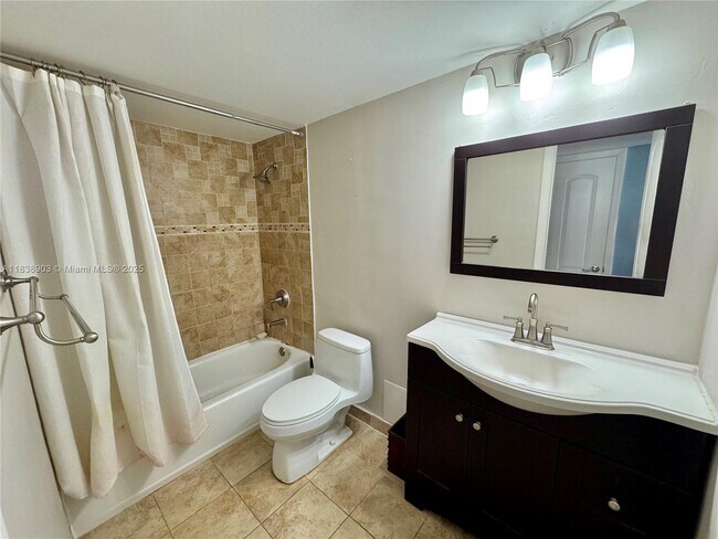 Building Photo - 5555 Collins Ave