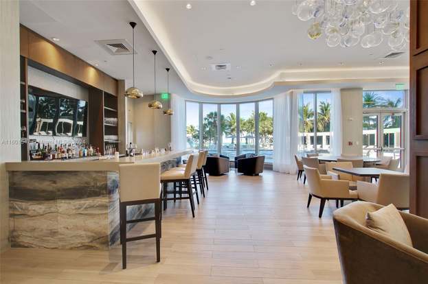 Building Photo - 10155 Collins Ave