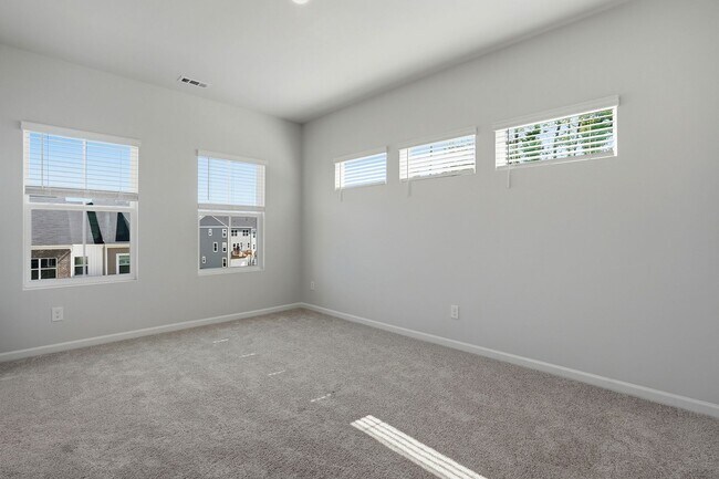 Building Photo - BRAND NEW TOWNHOME-9 FOOT CEILINGS-TWO CAR GARAGE-POOL COMMUNITY