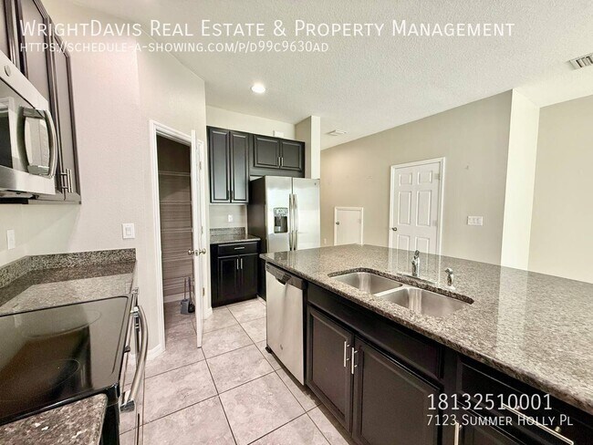 Building Photo - 7123 Summer Holly Pl