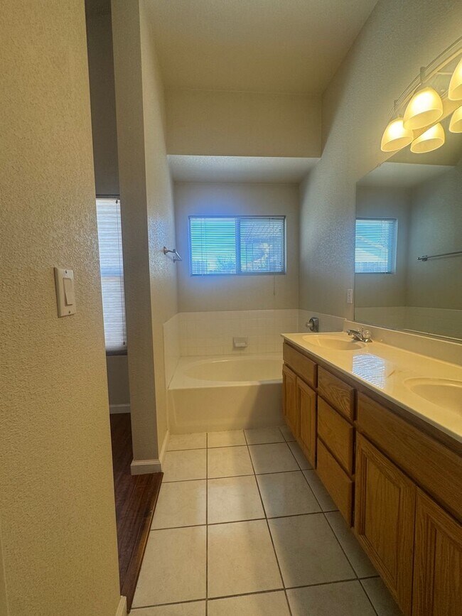 Building Photo - Beautiful 4-Bedroom Home with Solar, High ...
