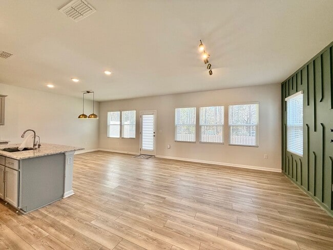 Building Photo - Stunning End Unit 3BD, 2.5BA Wendell Townhome with a 2-Car Garage in a Gorgeous HOA Community wit...