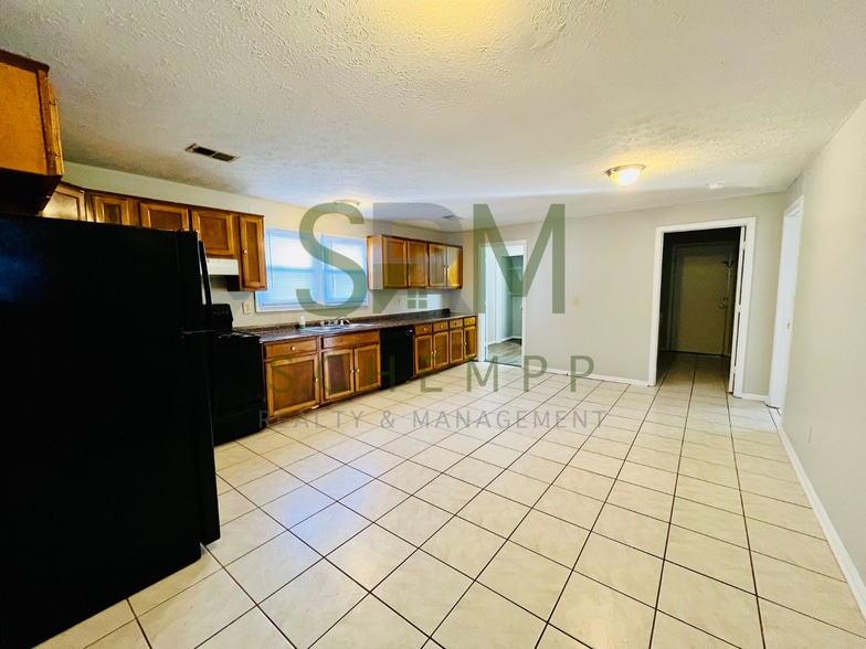 Building Photo - 4127 Churchman Ave