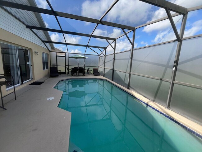 Building Photo - Now Leasing! Stunning 4BR Home in Gated Co...