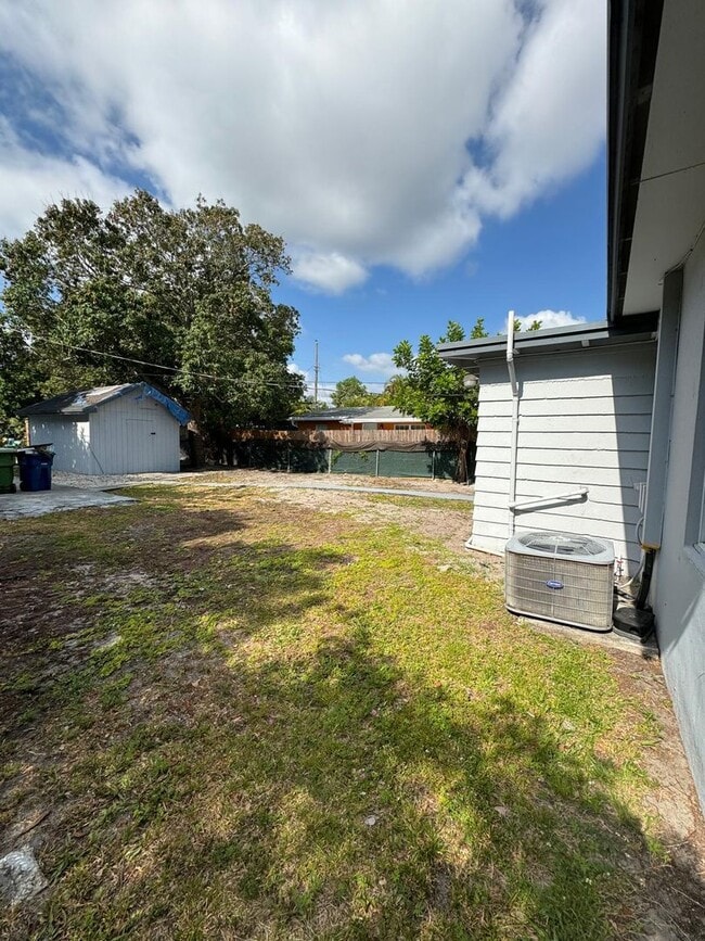 Building Photo - Spacious 4BR Home | Private Yard | Great L...