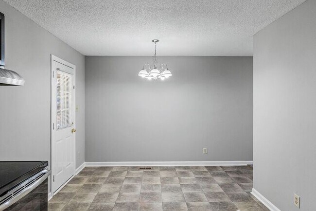 Building Photo - NE Home - Updated Kitchen and Bathrooms! SS Appliances, Fire Place, Front Porch & Deck, Fenced Yard!