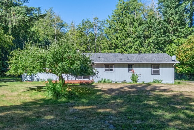 Building Photo - BEAUTIFUL UPDATED RAMBLER WITH LARGE GARGE