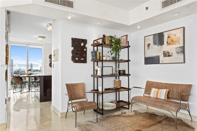 Building Photo - 18911 Collins Ave