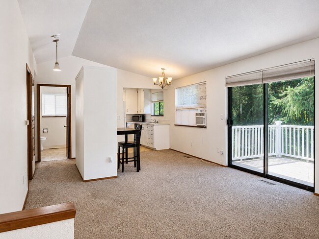 Building Photo - Beautiful Split-Level Home with Fireplace, Deck, Garage, and EV Charger