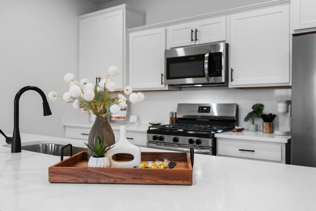 Building Photo - Brand New Three Bedroom Townhome in West L...