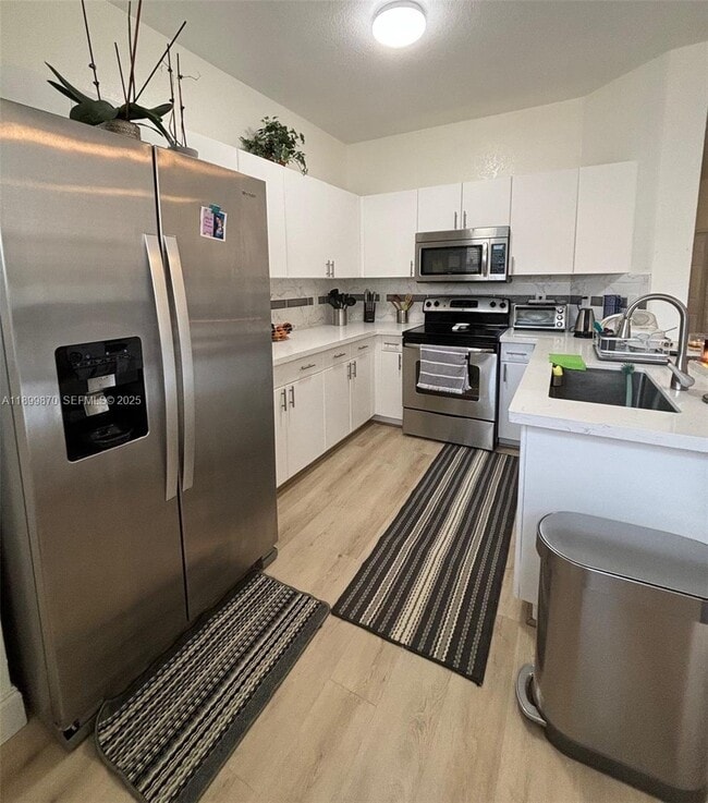 Building Photo - 12515 SW 124th Path