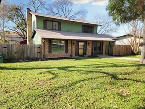 Building Photo - Spacious 4/BR 2.5/BA Two-Story Home with Fireplace & Huge Fenced Yard