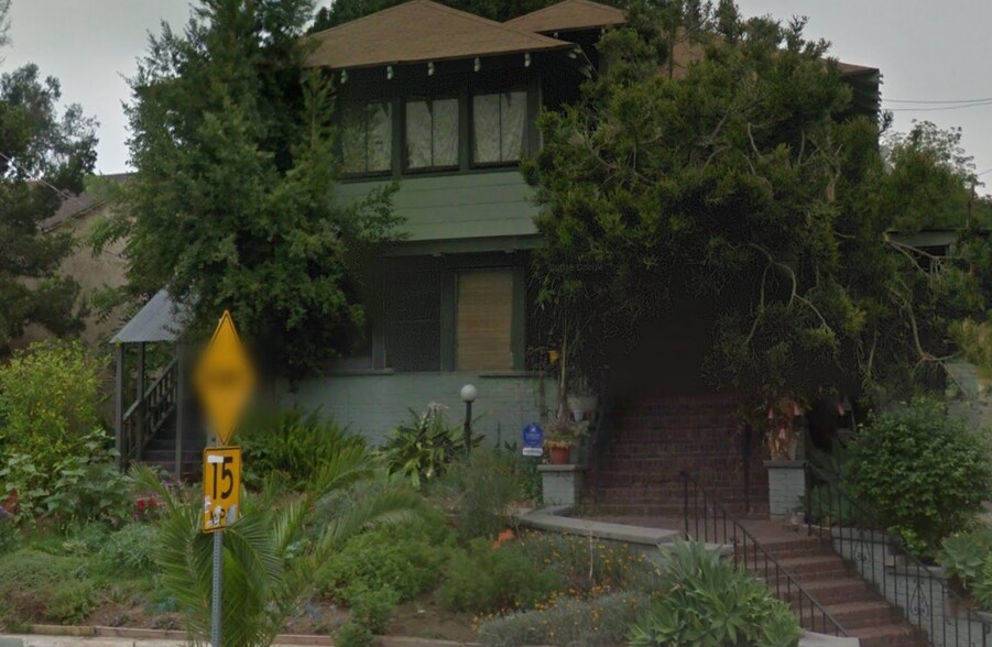 Front of the building. Unit 1 is under the covered patio area. - 937 North Benton Way