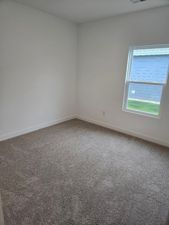 Building Photo - New Construction - Move in ready ranch home