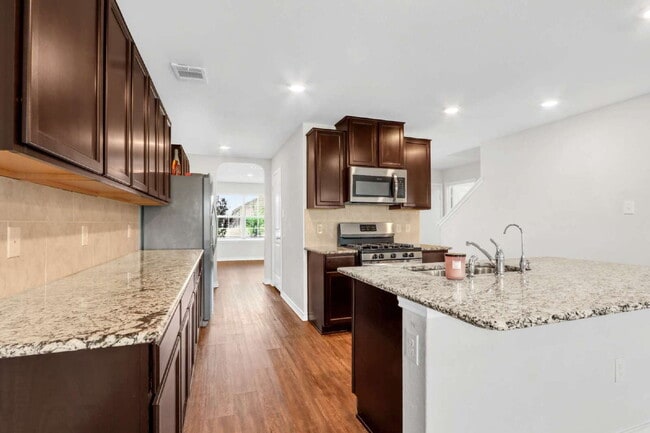 Building Photo - ONE MONTH FREE! Spacious 5-Bedroom Sanctuary with 2.5 Baths and Washer/Dryer Included!