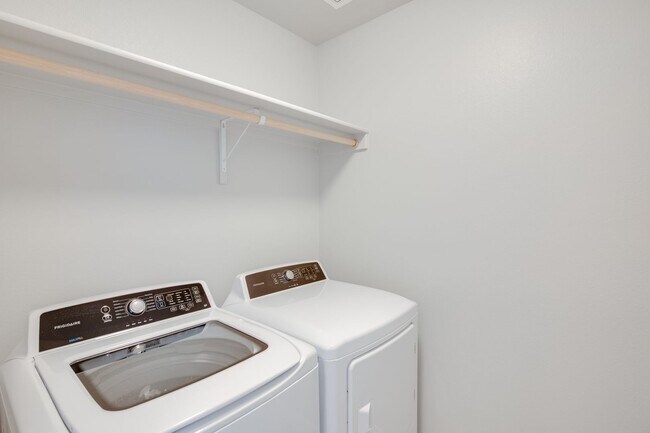 Building Photo - This gorgeous 3 bedroom, 2.5 bath townhome is 1440 square feet of HOME!