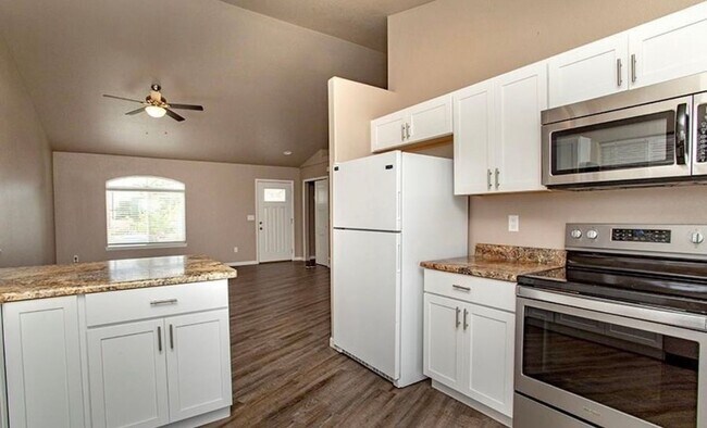 Building Photo - Move-In Special! FREE 50" TV for Qualified...