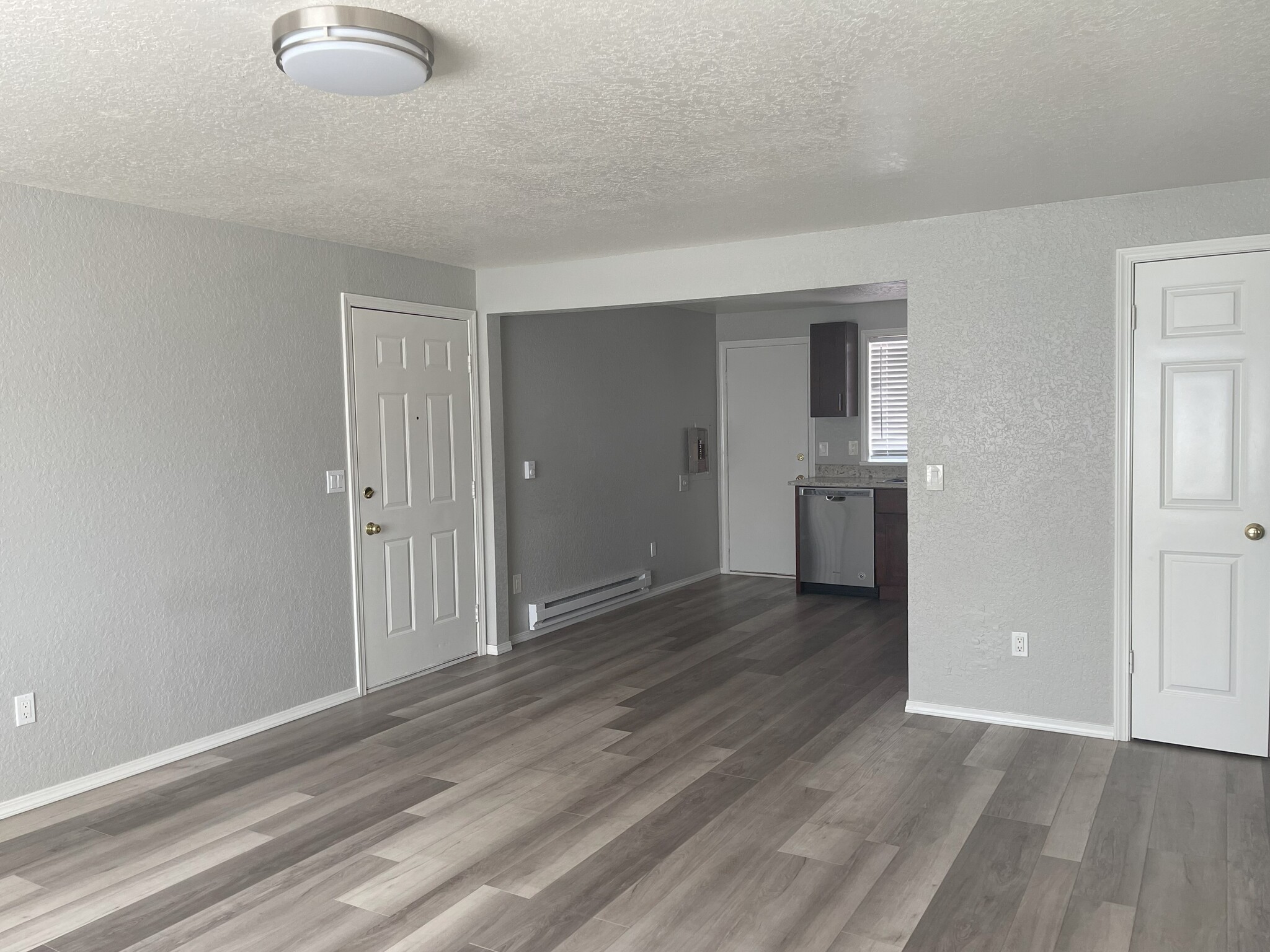 Living Room into the Kitchen - 11025 16th Ave SW