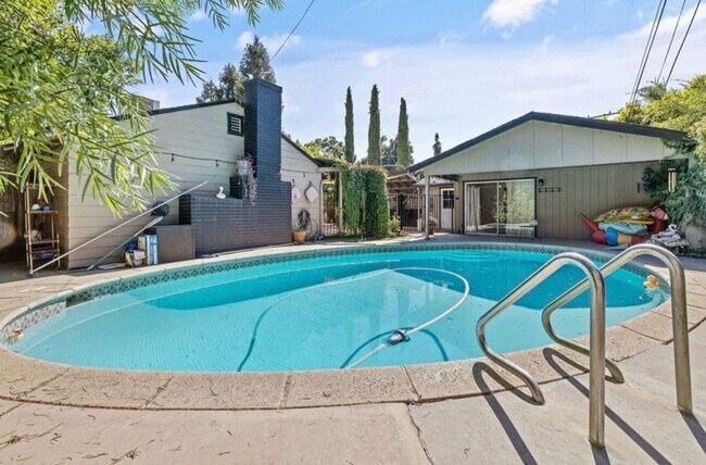 Building Photo - Beautiful home with Studio coming soon!