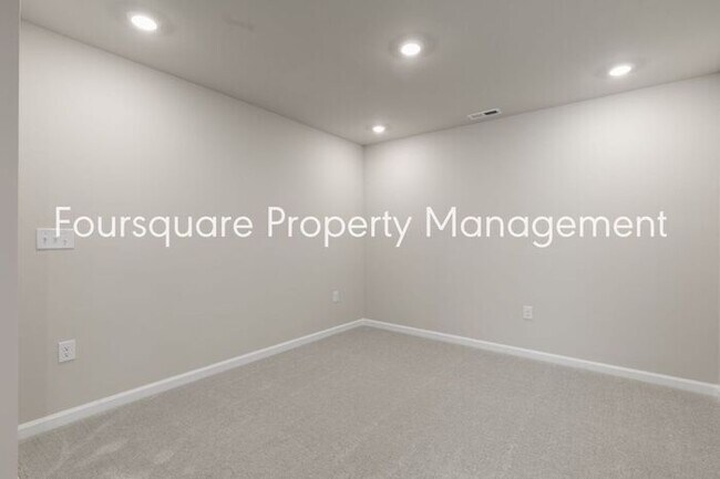 Building Photo - Coming Soon; July 27, 2026 : End unit ToSpacious End-Unit Townhome with 2nd Floor Loft, Screened-...