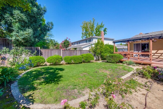 Building Photo - Large Landscaped Backyard! Fruit Trees