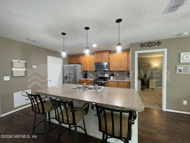 Building Photo - 15366 Bareback Dr