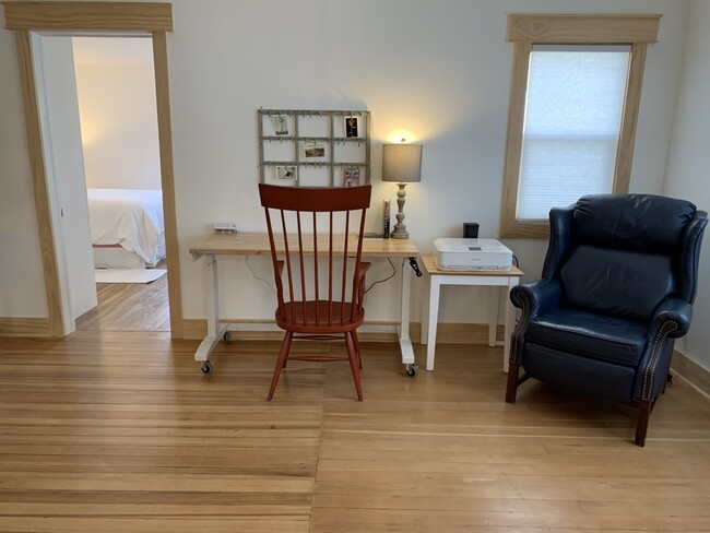 Office space includes printer and lovely large leather reclining chair. - 322 E 19th St