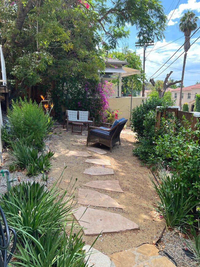 Lower level patio access from lower and main stairs - 6123 Scenic Ave