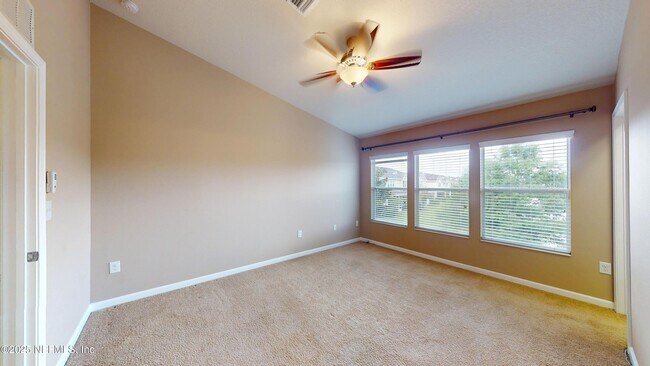 Building Photo - 6937 Woody Vine Dr