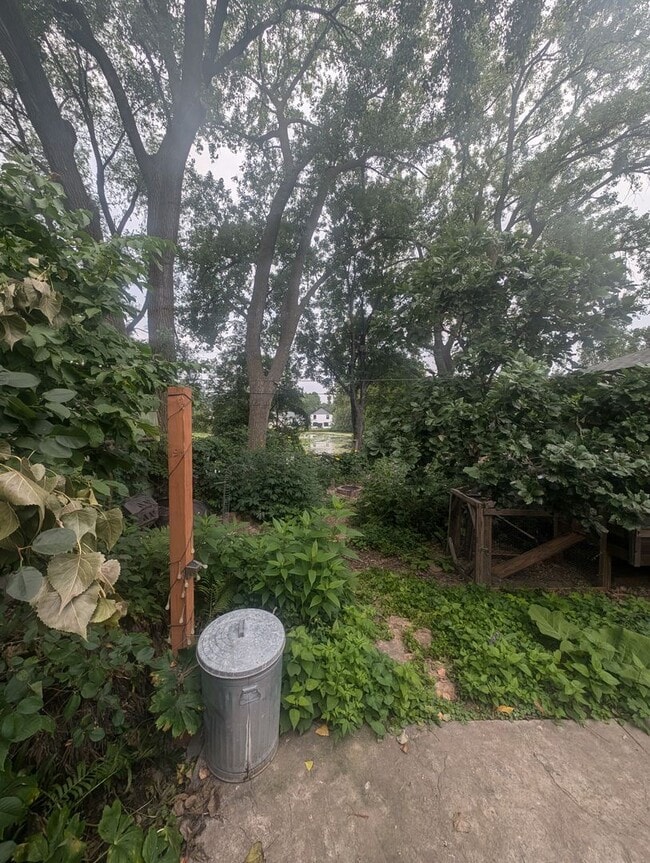 Building Photo - Charming Garden Oasis in West St. Paul – Fire Pit, Pond & Prime Location!