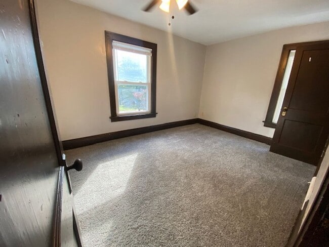 Building Photo - Updated 4-Bed with Porch & 2-Car Garage on...