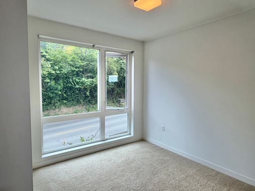 Building Photo - Industrial-Style Queen Anne Townhome with water views on every floor! AVAILABLE NOW!