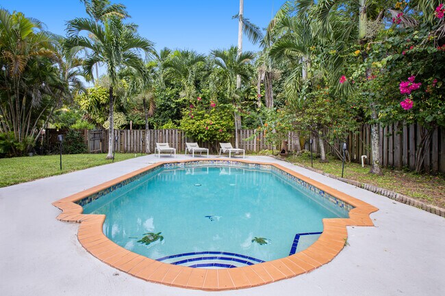 Pool and garden, daytime - 25 NW 95th St