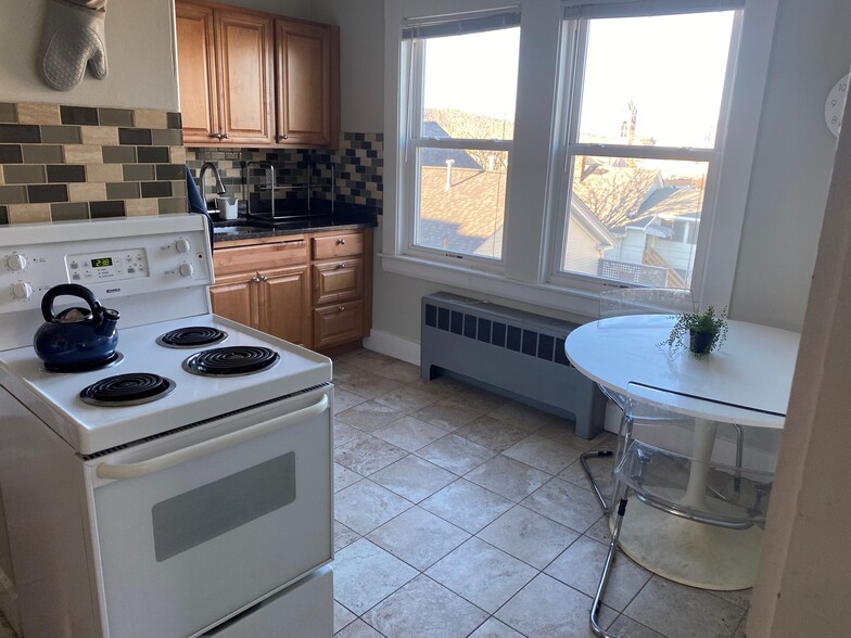 Kitchen with a view! New cabinets and granite countertops - 114 Brown St