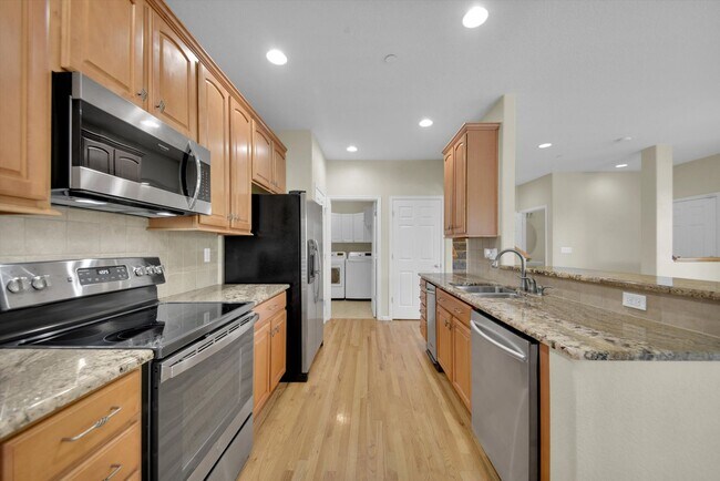 Building Photo - Modern 2-Bed, 3-Bath Home in The Village at Five Parks – Ralston Valley - AVAILABLE SEPTEMBER 1ST!!