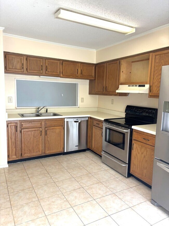 Building Photo - Two bed / Two bath condo off Grelot Road