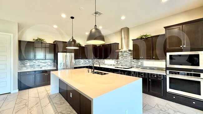 Building Photo - 10741 Tarragon Ave